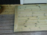 Höjning och renovering av fuktskadat hus, nya golv och ett litet kök